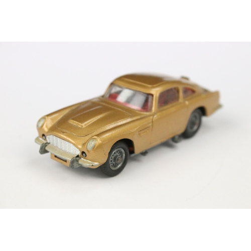 34 - Boxed Corgi 261 James Bond 007 Aston Martin DB5 diecast model with secret instructions and 2 x hench... 