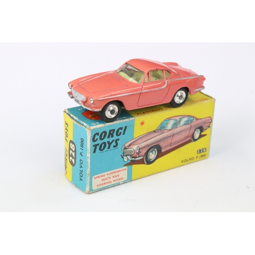 39 - Two boxed Corgi 228 Volvo P1800 diecast models in colour variants pink and red, both diecast models ... 