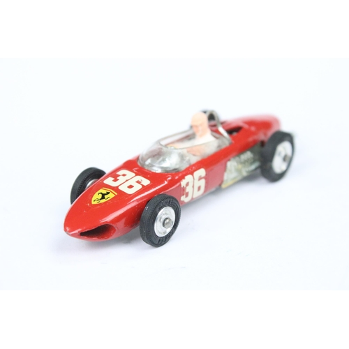 46 - Boxed Corgi 154 Racing Car Ferrari F1 diecast model in red with driver, race number 36, showing some... 