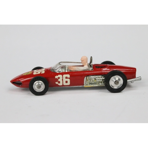 46 - Boxed Corgi 154 Racing Car Ferrari F1 diecast model in red with driver, race number 36, showing some... 