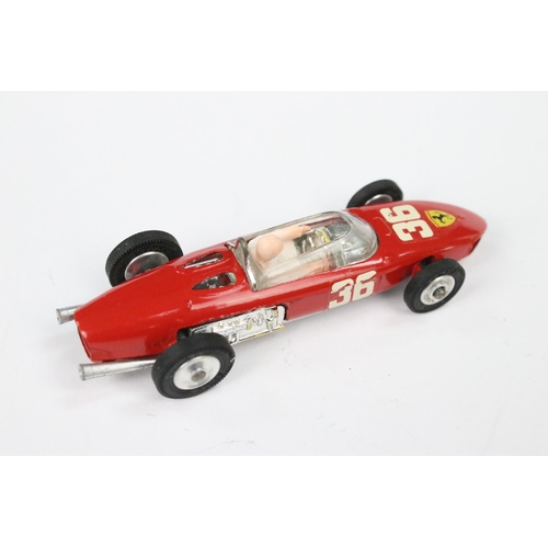 46 - Boxed Corgi 154 Racing Car Ferrari F1 diecast model in red with driver, race number 36, showing some... 