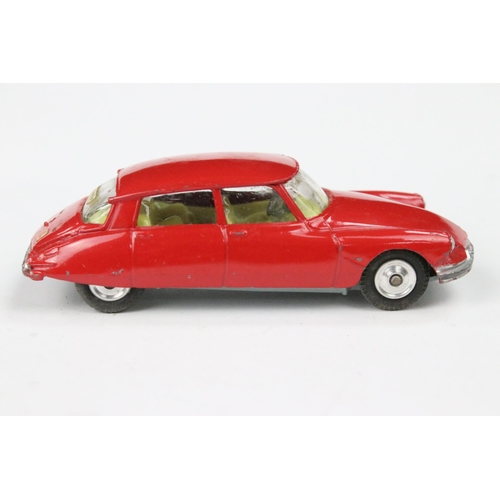 52 - Four boxed Corgi diecast models to include 210S Citroen DS19 in red with lemon yellow interior, 234 ... 