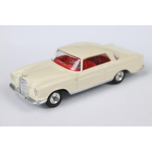 80 - Three boxed Corgi diecast models to include 224 Bentley Continental Sports Saloon in two-tone silver... 