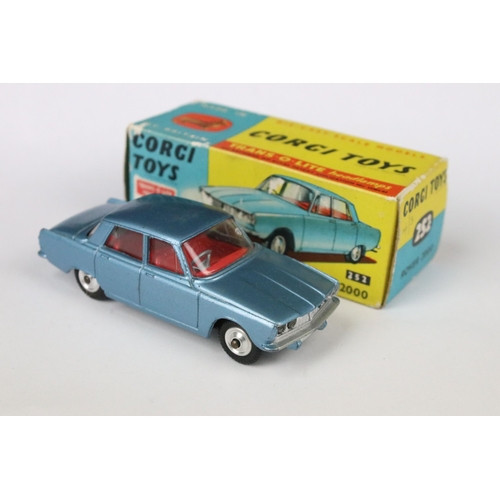 92 - Three boxed Corgi diecast models to include 318 Lotus Elan S2 with driver, 252 Rover 2000 and 241 Gh... 