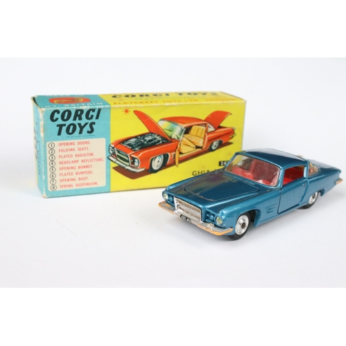 92 - Three boxed Corgi diecast models to include 318 Lotus Elan S2 with driver, 252 Rover 2000 and 241 Gh... 