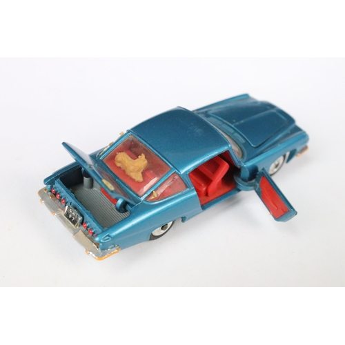 92 - Three boxed Corgi diecast models to include 318 Lotus Elan S2 with driver, 252 Rover 2000 and 241 Gh... 