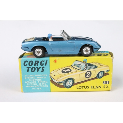 92 - Three boxed Corgi diecast models to include 318 Lotus Elan S2 with driver, 252 Rover 2000 and 241 Gh... 