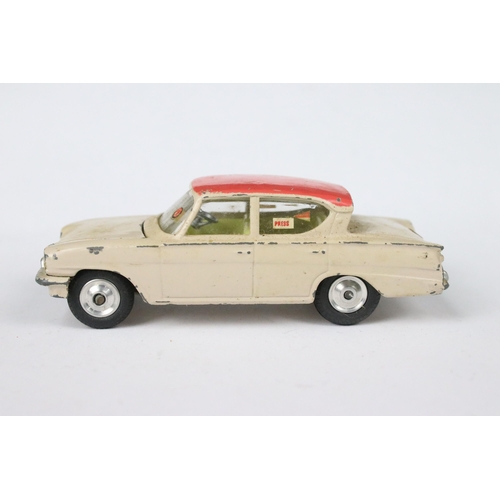 94 - Four boxed Corgi diecast models to include 234 Ford Consul Classic in pale fawn pink with lemon yell... 