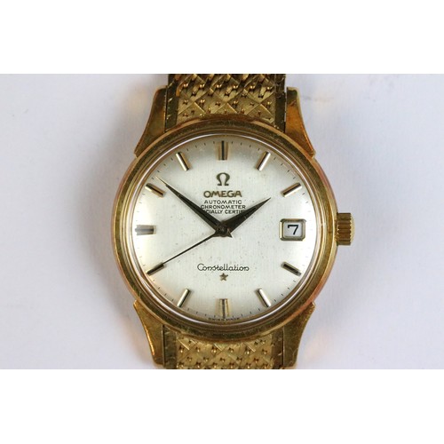 300A - 18ct gold Omega Constellation wrist watch having baton markings to the chapter ring with a date aper... 