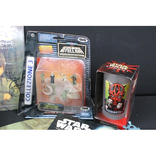 423 - Star Wars - Ephemera and collectables to include 17 x books (3 x hardback), 2 x signed Episode I Com... 