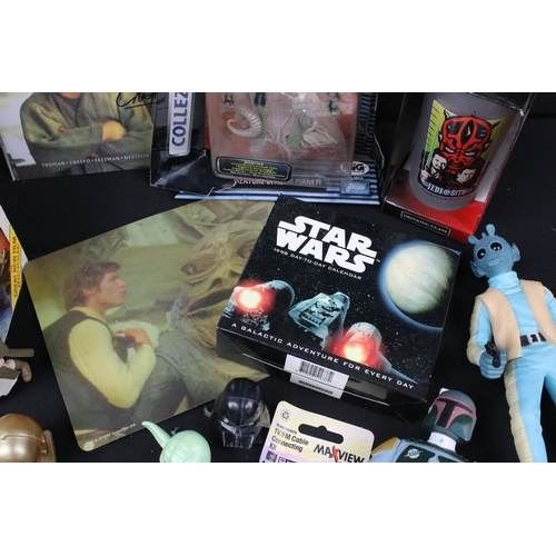 423 - Star Wars - Ephemera and collectables to include 17 x books (3 x hardback), 2 x signed Episode I Com... 