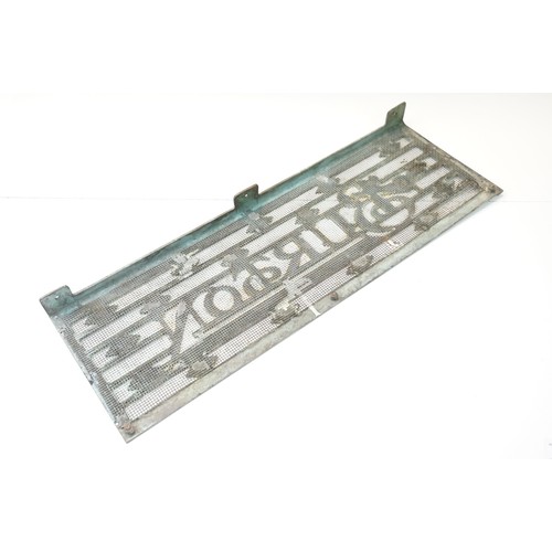 139A - 20th century Montague Burton 'The Tailor of Taste' brass shop sign door grill, H 20.5cm W 61.5cm