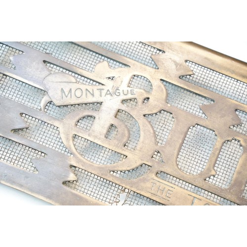 139A - 20th century Montague Burton 'The Tailor of Taste' brass shop sign door grill, H 20.5cm W 61.5cm