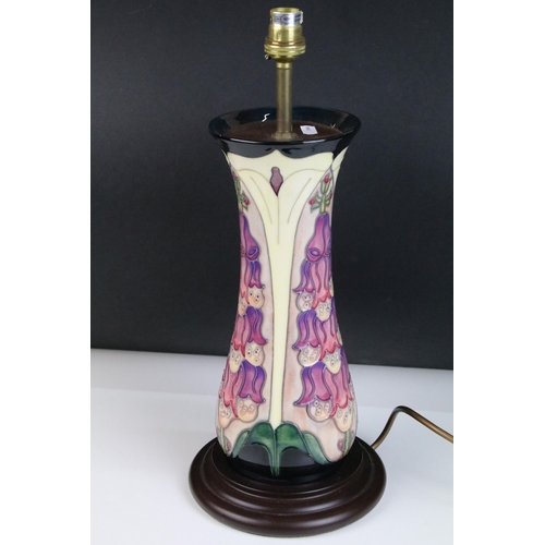 1 - Moorcroft foxglove pattern table lamp base on circular wooden base, measures 43cm (to top of light f... 