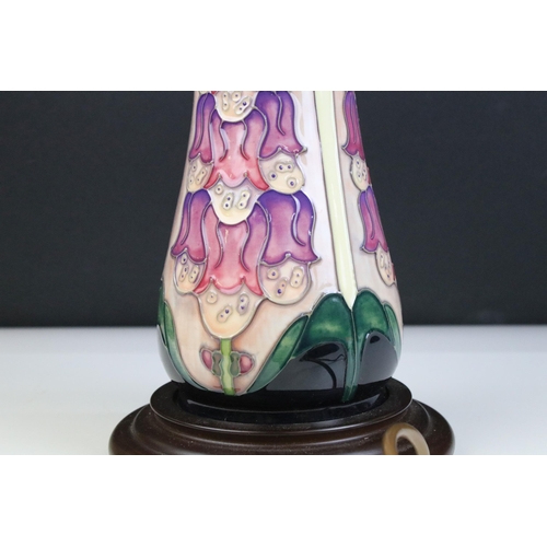 1 - Moorcroft foxglove pattern table lamp base on circular wooden base, measures 43cm (to top of light f... 