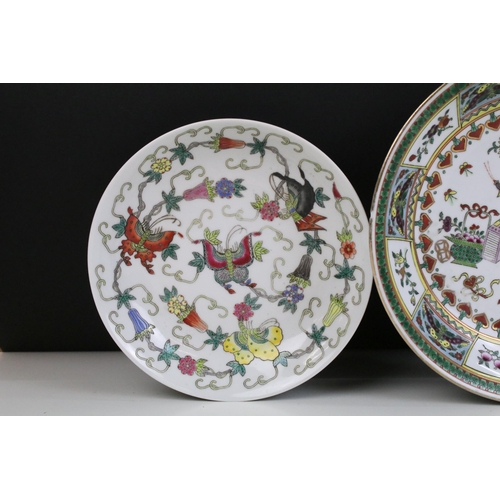 13 - Pair of Chinese famille rose shallow bowls and a matching tea bowl, each decorated with butterflies ... 