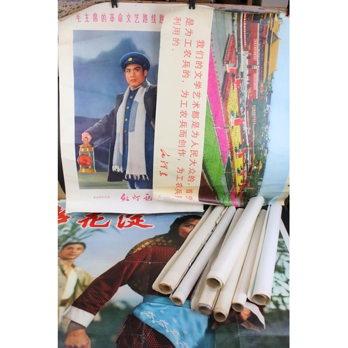 130 - Nine mid century Chinese propaganda posters together with a Chinese film poster