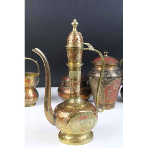 134 - A small collection of decorative Indian brassware with enamel decoration.