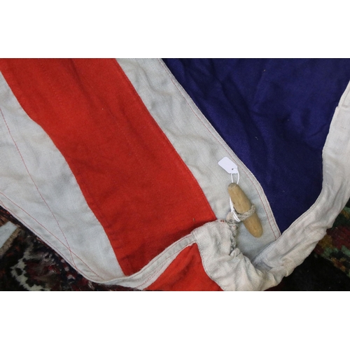 135 - A vintage John Edgington & Co. union jack flag, approx 170cm.