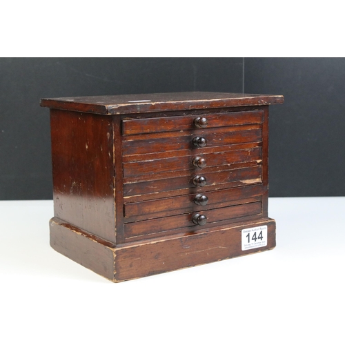 144 - Mahogany coin collectors cabinet with six lined drawers H 18.5cm, W 23cm, D 18cm