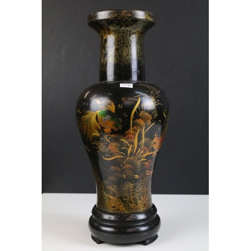 174 - Vase featuring exotic pond fish on a black background with footed base H 40cm