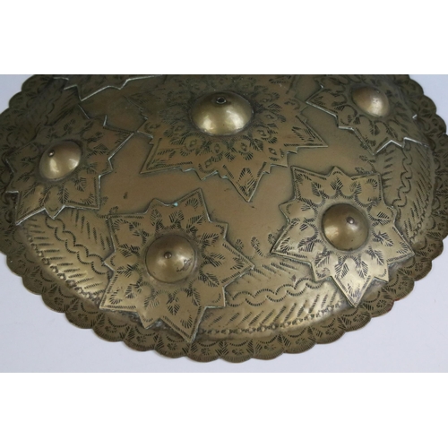 178 - Cast brass round shield with star style detail, diameter 33.5cm