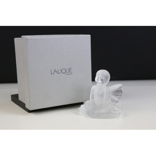 2 - Lalique 2005 'Impish Baby Girl Figure' seated with outstretched fairy wings, H 9cm, boxed