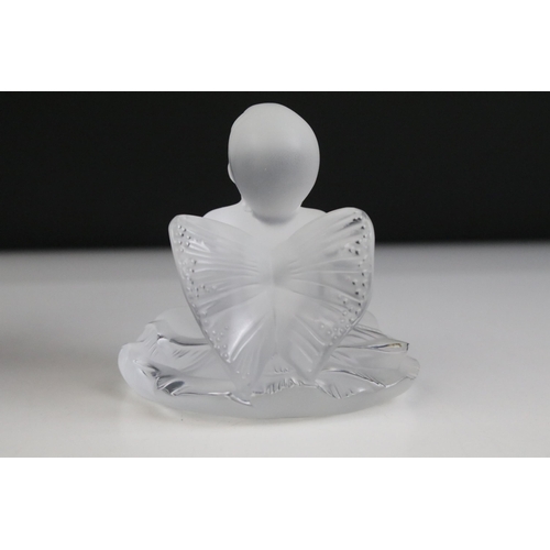 2 - Lalique 2005 'Impish Baby Girl Figure' seated with outstretched fairy wings, H 9cm, boxed