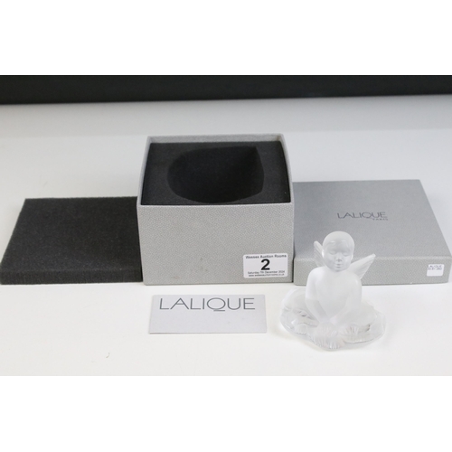 2 - Lalique 2005 'Impish Baby Girl Figure' seated with outstretched fairy wings, H 9cm, boxed