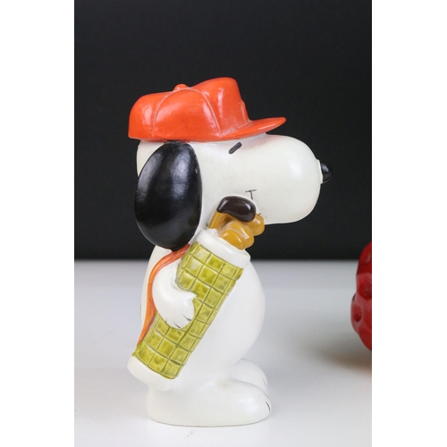 20 - 20th century vintage ceramic Snoopy money box figurines to include Snoopy on giant strawberry, Snoop... 