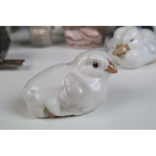 25 - Quantity of Royal Copenhagen and other animal figurines to include doves 402, white rabbit 4705, owl... 