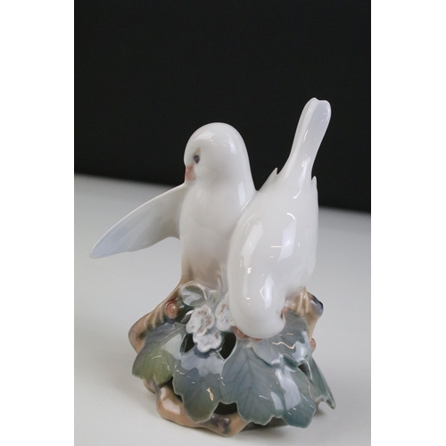 25 - Quantity of Royal Copenhagen and other animal figurines to include doves 402, white rabbit 4705, owl... 