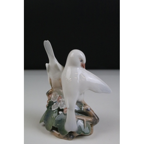 25 - Quantity of Royal Copenhagen and other animal figurines to include doves 402, white rabbit 4705, owl... 