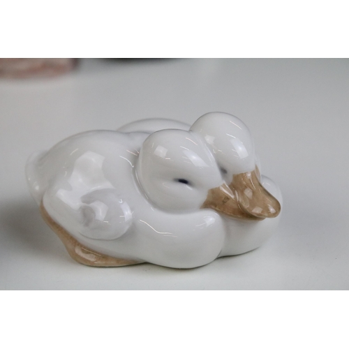 25 - Quantity of Royal Copenhagen and other animal figurines to include doves 402, white rabbit 4705, owl... 