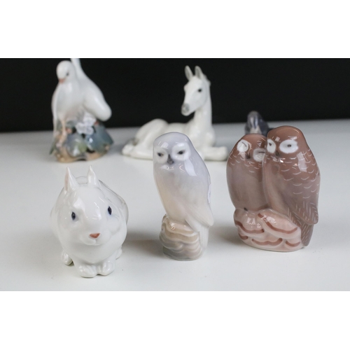 25 - Quantity of Royal Copenhagen and other animal figurines to include doves 402, white rabbit 4705, owl... 