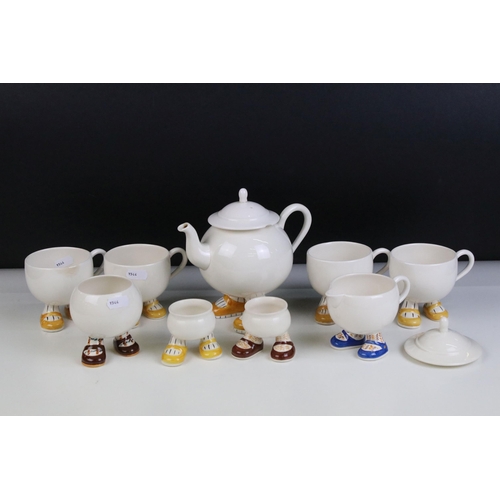 27 - Carlton ware 'Walking Ware' part breakfast set to include four 'footed' cups, tea pot, milk jug, sug... 