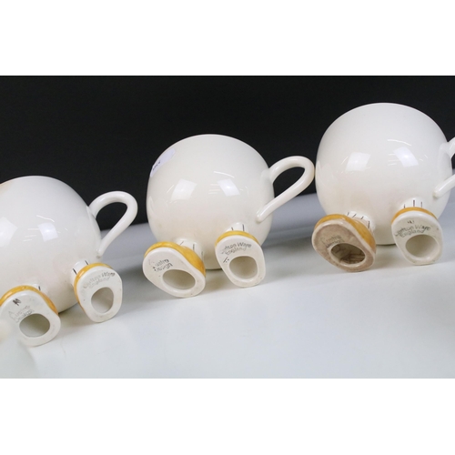 27 - Carlton ware 'Walking Ware' part breakfast set to include four 'footed' cups, tea pot, milk jug, sug... 