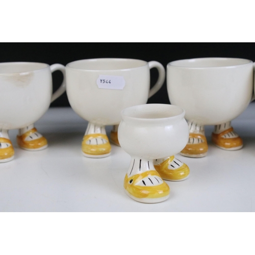 27 - Carlton ware 'Walking Ware' part breakfast set to include four 'footed' cups, tea pot, milk jug, sug... 