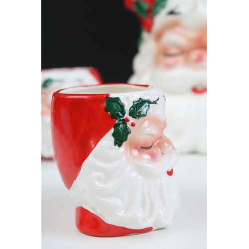 4 - 20th century ceramic Santa jug and a set of four matching beakers