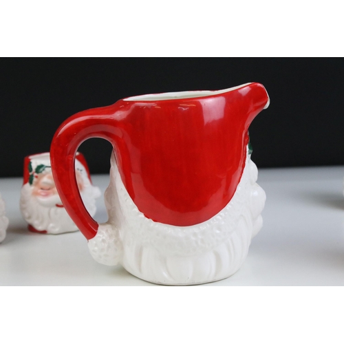 4 - 20th century ceramic Santa jug and a set of four matching beakers