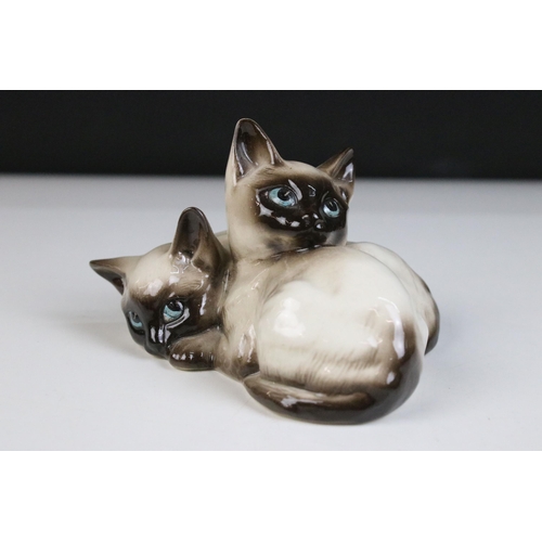 37 - Group of four Beswick figurines to include Shetland pony, Owl 2026,  Siamese kittens 1296 and mouse ... 