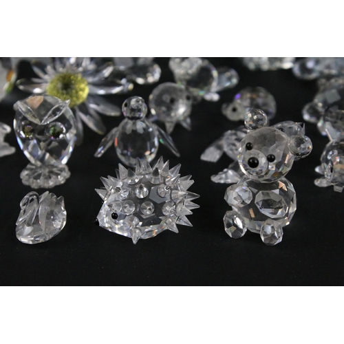 47 - Large quantity of Swarovski crystal animal and ornaments to include hedgehogs, owls, cats, tortoises... 