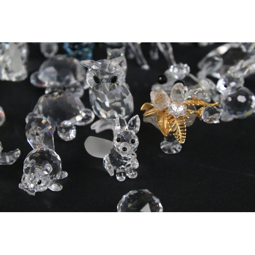 47 - Large quantity of Swarovski crystal animal and ornaments to include hedgehogs, owls, cats, tortoises... 