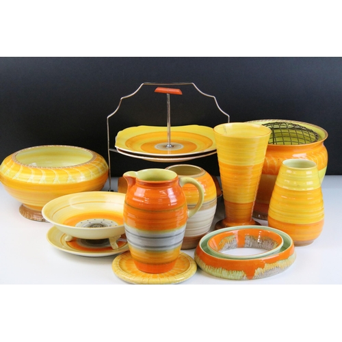 51 - Collection of Shelley Harmony ware in varying sunset tones of orange and yellow, to include jardinie... 