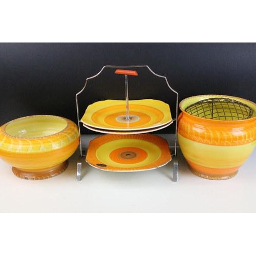 51 - Collection of Shelley Harmony ware in varying sunset tones of orange and yellow, to include jardinie... 