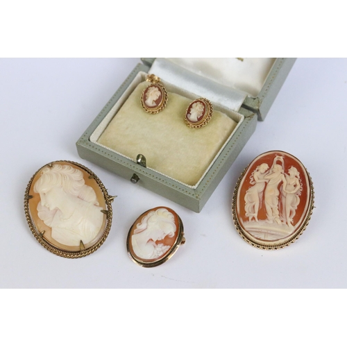 103 - A 9ct gold cameo brooch together with a pair of 9ct gold earrings, 18ct gold cameo brooch and a yell... 