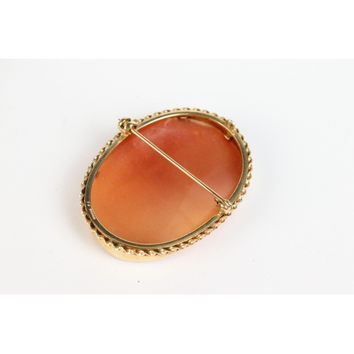 103 - A 9ct gold cameo brooch together with a pair of 9ct gold earrings, 18ct gold cameo brooch and a yell... 