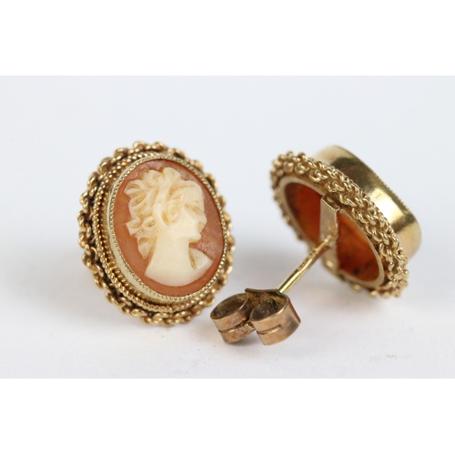 103 - A 9ct gold cameo brooch together with a pair of 9ct gold earrings, 18ct gold cameo brooch and a yell... 