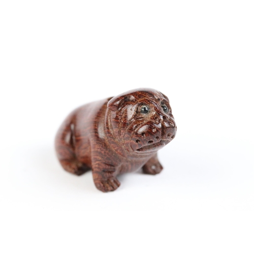 111 - Three miniature wood netsuke figures to include bulldog, money goat and face of a wise old man