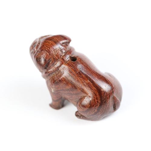 111 - Three miniature wood netsuke figures to include bulldog, money goat and face of a wise old man